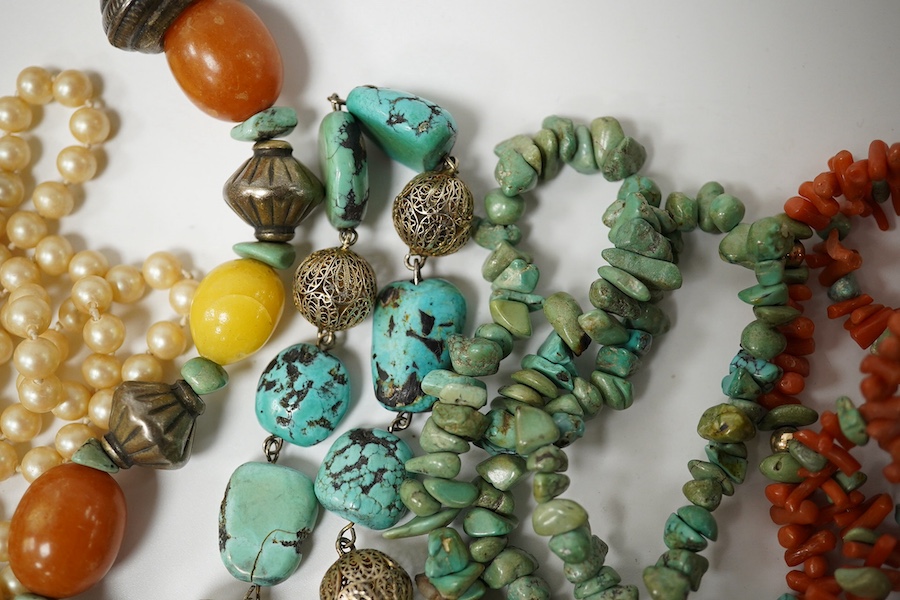 Seven assorted necklaces including turquoise and turquoise and coral longest approx. 80cm. Condition - poor to fair